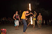 Young man juggeling with fire, Full Moon Party, Hat Rin Nok, Sunrise Beach, Ko Pha-Ngan, Thailand
