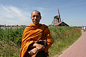 Asian monk, staying on land, cruise ship MS Delphin Renaissance, Cruise Bremerhaven - South England, England