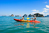 Couple kayaking around Ko Hong, Phang Nga bay, Krabi, Thailand, after the tsunami