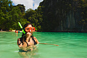 Young woman snorkeling in a lagoon, Koh Hong, Hong Island, Krabi, Thailand