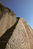 Pilgrimage route, stone steps to Lotus Peak under blue sky, Huang Shan, Anhui province, China, Asia