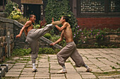 duel and training between two Shaolin monks, Shaolin Monastery, known for Shaolin boxing, Taoist Buddhist mountain, Song Shan, Henan province, China, Asia