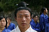 Taichi teacher with hair pinned up with a writing pen, Wudang Shan, Taoist mountain, Hubei province, Wudangshan, Mount Wudang, UNESCO world cultural heritage site, birthplace of Tai chi, China, Asia