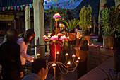 Lighting the candles during the birthday celebrations for Wenshu, Shuxiang temple, Mount Wutai, Wutai Shan, Five Terrace Mountain, Buddhist Centre, town of Taihuai, Shanxi province, China