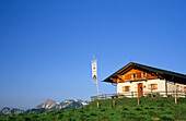 Piesenhauser Hochalm alpine hut and view to Geigelstein, Chiemgau Alps, Upper Bavaria, Bavaria, Germany