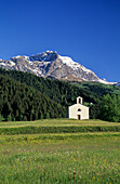 Chapel in Selva and view to Corno Campascio, Puschlav, Grisons, Switzerland