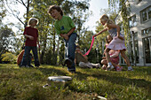 Children playing Hit the Pot, children's birthday party