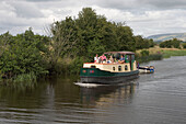 Irish Family on Barge Houseboat, River Shannon, near Leitrim, County Leitrim, Ireland