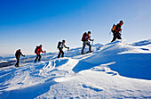 A group of people on a ski tour to the top of the Popova Kapa in the Rila Mountains, Europe, Bulgaria, MR