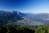 View of Garmisch Partenkirchen with Zugspitze from the summit of the Wank, Bavaria, Germany
