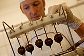 Manufacture of the original Mozartkugeln, chocolate coated confectionery, from Furst confectioners, Salzburg, Austria