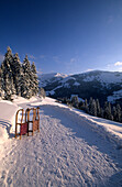 Toboggan-run in winter landscape with two sledges, Natrun, Maria Alm, Salzburg, Austria