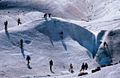Mountaineerers during training with crampons, glacier of Morteratsch, Bernina, Oberengadin, Grisons, Switzerland