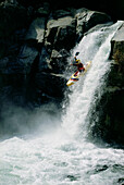 Canoeing down a waterfall