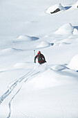 Skier on powdersnow, St Luc, Chandolin, Valais, Switzerland