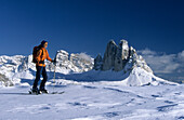 back country skier with view to Drei Zinnen, Dolomites, South Tyrol, Italy