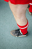 Soccer player, close-up leg