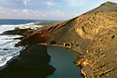 Village of El Golfo and crater of El Golfo, Charco de los Clicos, lagoon, extinct volcano at the Seaside, Lanzarote, Canary Islands, Atlantic Ocean, Spain