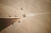 Car at Dune 45, aerial view over Namib Desert, Namibia, Africa
