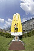 Young man scaling free climbing wall (Popsicle), Haiming, Tyrol, Austria