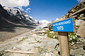 Signpost galcier reduction, Pasterze glacier and Grossglockner, Carinthia, Austria