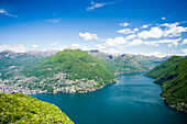 Panoramic view from Monte San Salvatore (912 m) over Lake Lugano and Lugano, Ticino, Switzerland
