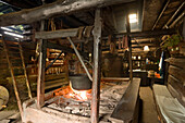 Open fireplace, which is still used daily, Karseggalm (1603 m, one of the oldest mountain hut in the valley), Grossarl Valley, Salzburg, Austria