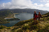 Hikers on Lagoa do Fogo, Azores, Portugal