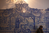 Woman praying at the Capilla of Convento da Esperanca