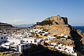 View over house to hill with Acropolis, Lindos, Rhodes, Greece