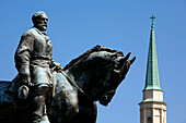 Statue of General Robert E Lee in front of blue sky, Charlottesville, Virginia, USA