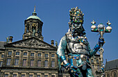 Street entertainer in front of Royal Palace, Dam, Amsterdam, Netherlands, Europe