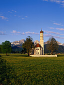 View of St. Coloman with mountains in the background, near Schwangau, Allgeau, Bavaria, Germany