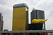 Main building of Asahi brewery under clouded sky, Asakusa, Tokyo, Japan, Asia