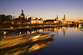 Deutschland, Dresden, panoramic view from bridge over river Elbe at sunset, Fraunekirche, Hofkirche, Semper opera house, tour boat