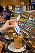 coffee with milk in a glass, cortado, Spanish cafe, Valencia, Spanien