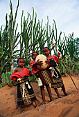 Antadroy children with ostrich egg, Magadascar, Africa