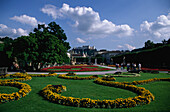 Tourists walking through Mirabell garden, Schloss Mirabell, Hohensalzburg Fortress, Salzburg, Austria