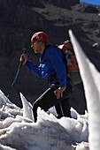 A man ascending the south face of Cerro Marmolejo, 6085 m, Ice Climbing, Chile