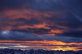 Karwendel range with dramatic cloud formation at sunset from Guffert, Rofan range, Tyrol, Austria