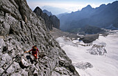 Mountaineerer ascending fixed rope route above glacier Höllentalferner, Zugspitze, Wetterstein range, Upper Bavaria, Bavaria, Germany