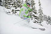 Skier on slope, Sunshine Village ski resort, Banff, Alberta, Canada