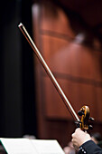 Man holding stringed bowed instrument, Munich Symphony Orchestra, Prinzregententheater, Munich, Bavaria, Germany