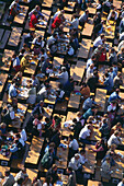 High Angle View at occupied benches and tables at the Octoberfest, Munich, Bavaria, Germany