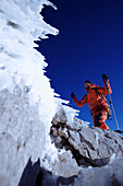 Mountaineer on a ridge, Ehrwald, Wetterstein Range, Tyrol, Austria