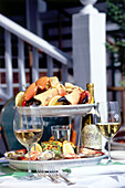 Plate of stone crabs and different shellfish and seafood, Restaurant Smith & Wollensky, South Beach, Miami, Florida, USA
