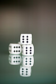 Three dice showing number six