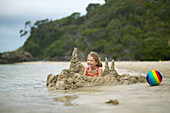 Girl at the beach, Karikari Bay at northern eastcoast, Northland, North Island, New Zealand