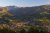 View over town and mountains in the evening light, St. James Way, St. Jean-Pied-de-Port, Pyrenees, Euskadi, Dep.Pyrénées-Atlantiques, France