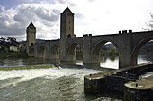 Old stone bridge, Pont Valentré, with towers and lock, valley of the river Lot, Cahors, Department Lot, France